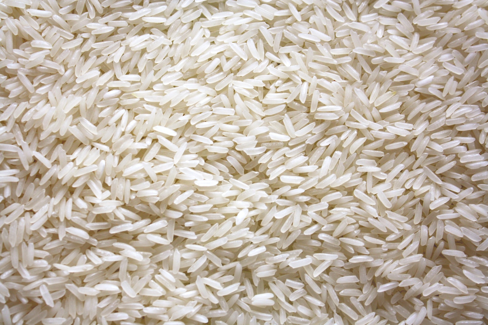 a pile of white rice sitting on top of a table