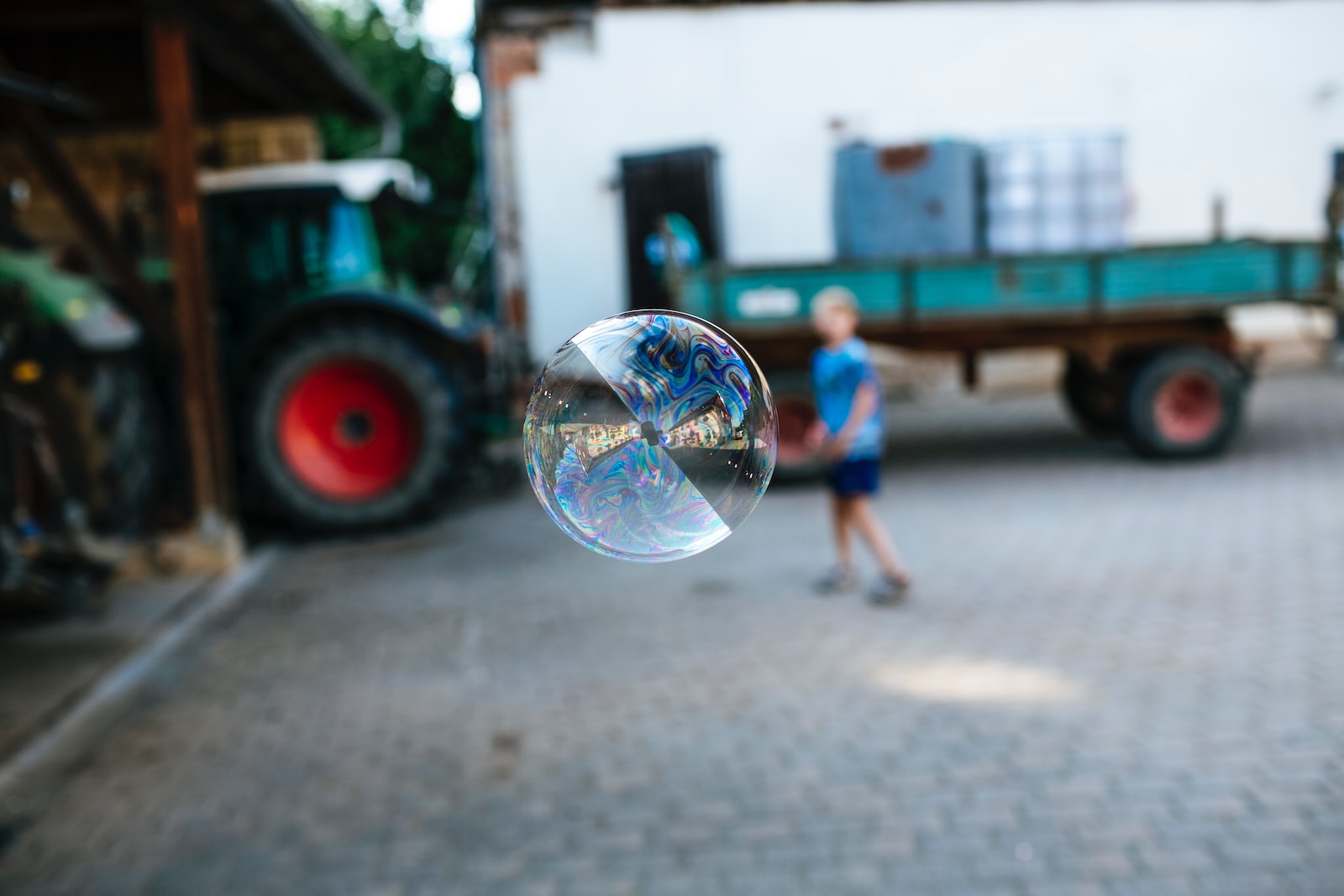 selective focus photography of bubble on road during daytime